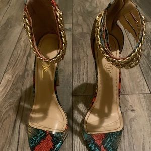 Snake skin heels, clear strap chained ankles